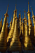 Inle Lake Myanmar. Indein, on the summit of a hill the  Shwe Inn Thein Paya a cluster of hundreds of ancient stupas. Many of them are ruined and overgrown with bushes. 